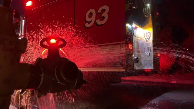 fire truck getting water from hydrant