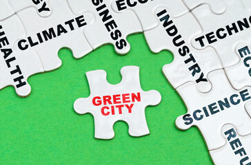 On a green background, white puzzles with text, a puzzle with the inscription - Green City