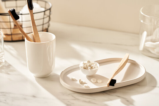 Bamboo toothbrushes and solid toothpaste - Powered by Adobe