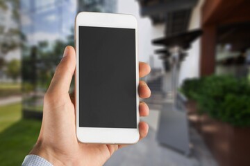 Smartphone with blank screen, concept of corona vaccination to be allowed to travel