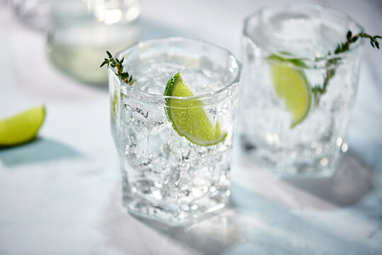 Glasses of Gin and Tonic with Lime and Rosemary