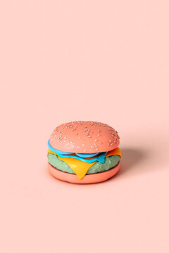 funny and colorful pink vegetarian hamburger 