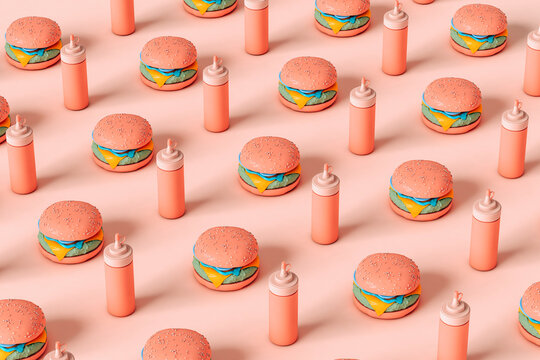 multiple cheeseburgers and sauces bottles