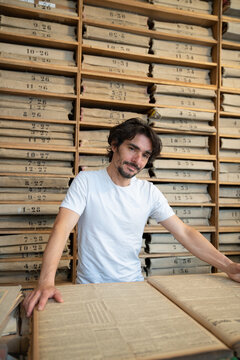 Man In Old Press Archive