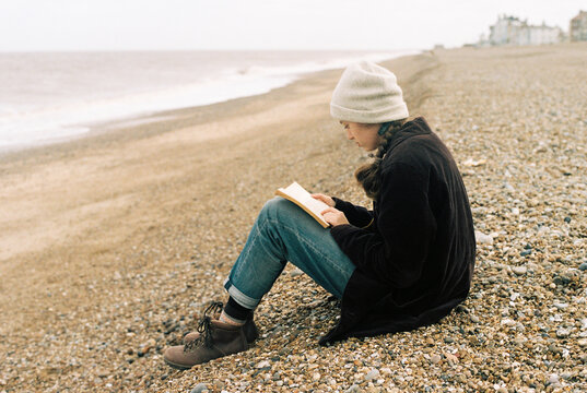 Girl reading on beach