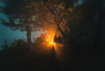 Camping with friends in the night 