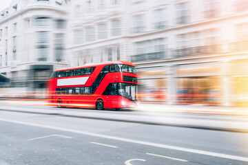 Fototapeta na wymiar London Red Bus in motion