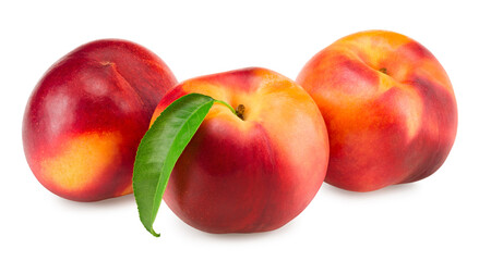 Nectarine with green leaf isolated on white background. clipping path