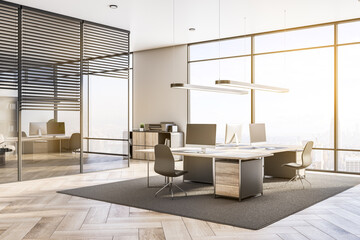 Contemporary office interior with equipment, furniture, sunlight, window with city view and wooden...