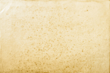 background of empty stained old paper, top view