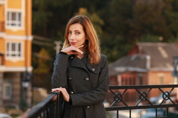 Fototapeta premium Portrait of a beautiful woman outside