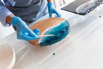 the process of making the sea on a two-component resin board, master class on resin art