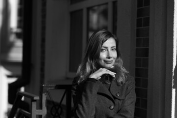 Black and white urban portrait of a woman