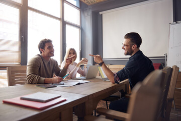 Business people talking and working at office