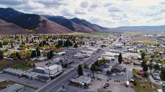 Aerial view over the small town of Afton Wyoming viewing traffic on the street below.