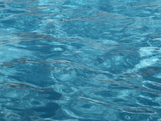Blue moving water in the pool