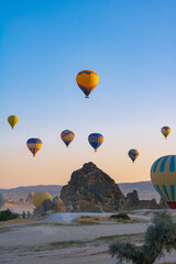 Hot air balloons and fairy chimneys in Cappadocia Turkey