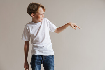 Portrait of a casual preteen boy in t-shirt standing