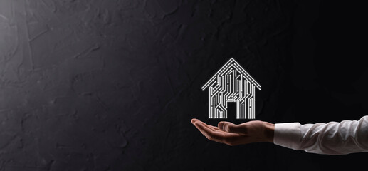 Hand hold house icon.Smart home controlled, intelligent house, and home automation app concept.Pcb...