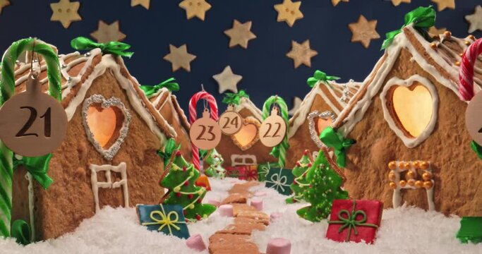 Gingerbread cottages at night. Christmas Eve in gingerbread village.