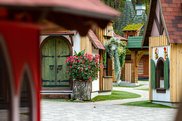 gnome village in attraction park, tiny dwarf houses with colorful facades, fairy tale village © ako-photography