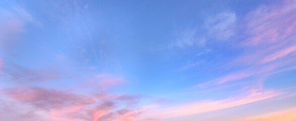 Glowing sky at dusk on a fall evening. Banner, panoramic.