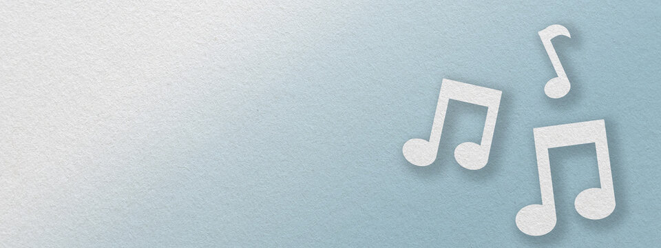Music note icon design on blue background with copy space.