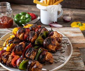 Chicken meat skewers with onions and bell pepper