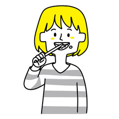 歯磨きをしている若い女性