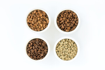 Obraz na płótnie Canvas Light Roast, Medium Roast, Dark Roast and Green Coffee Beans in Ramekins isolated on White