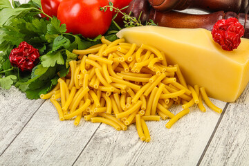Italian pasta raw Maccheroni for cooking