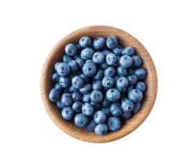 Blueberries in a wooden bowl. Ripe blueberries with copy space for text. Blueberry isolated on white. Bilberries on a white background. Top view. Blueberries on a white background.
