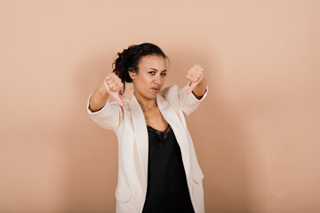 Beautiful female portrait isolated on studio backgroud. Human emotions, facial expression concept.