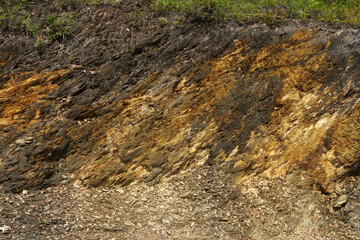 Clastic Sedimentary rock has the original texture of sediments such as sand, rubble and soil.