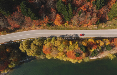 Autumn colors and mountain road aerial view
