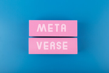 Metaverse modern minimal concept with written text meta verse on pink rectangles against dark blue...