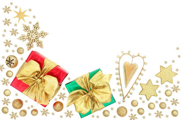 Christmas composition with gift boxes, retro gold heart ornament, star, ball and snowflake baubles on white background. Romantic giving concept for the festive season. 