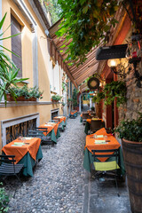 Fototapeta na wymiar Narrow streets in picturesque town of Bellagio in Lake Como, Italy