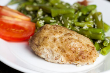 baked asparagus beans with sesame seeds and meat cutlet