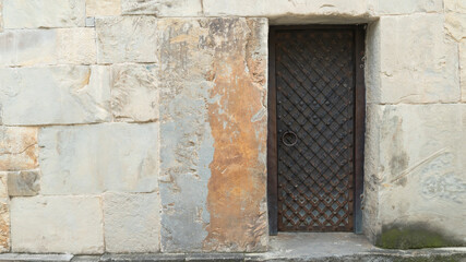 Fototapeta na wymiar antique door. iron handles on the old door