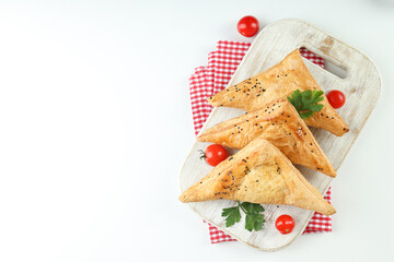 Concept of tasty food with samsa on white background