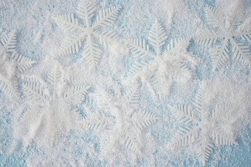 Winter holiday concept. Background made of white snowflakes. Flat lay.