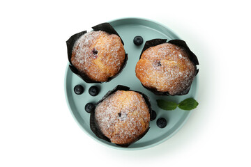 Plate with chocolate muffins isolated on white background
