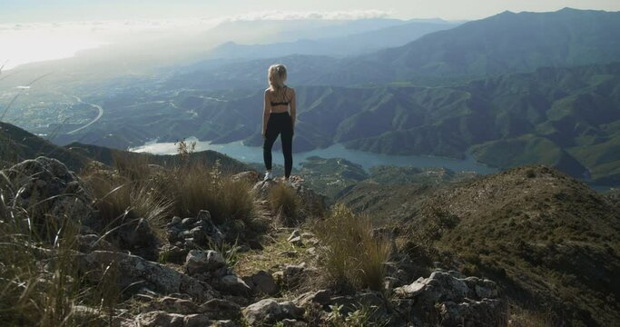 Young Blond Woman Looking At Dramatic Landscape Of La Concha