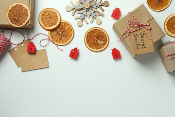 Secret Santa and Christmas composition on white background