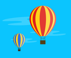 Two hot air balloons flying in blue sky