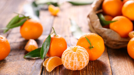 clementine,  mandarin orange fruit and leaves