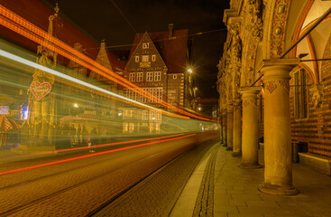 Bremen by night . The Roland with the Freimarkt 