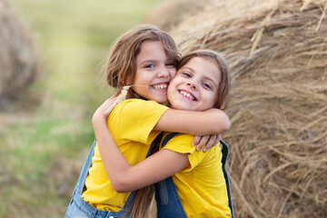 portrait of children in straw