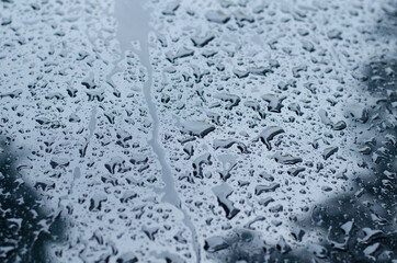 Raindrops on the surface. Wet surface after rain.